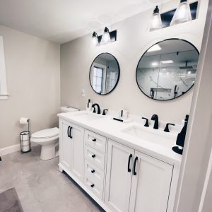 Bathroom remodeling project with double vanity and modern mirrors in Connecticut