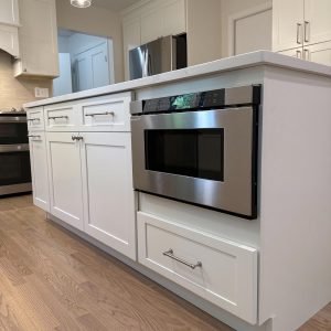 Custom kitchen remodeling with built-in wall oven and modern cabinetry in Connecticut