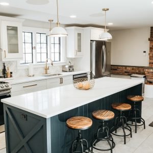 Kitchen island with seating and modern cabinets in remodeled Connecticut kitchen