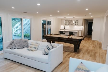 Basement Remodeling Project – Yart Home Improvements Connecticut Finished basement living space with entertainment area remodeled by contractor in Connecticut