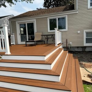 Custom backyard deck construction with stairs completed by Yart Home Improvements in Newington Connecticut