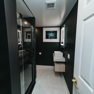 Bathroom remodeling project with modern shower and vanity renovation completed in Connecticut
